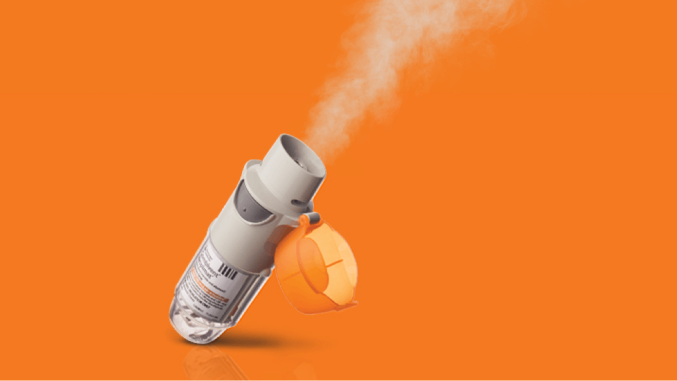 A COMBIVENT RESPIMAT inhaler spraying a mist and Ease of Use certification from the Arthritis Foundation